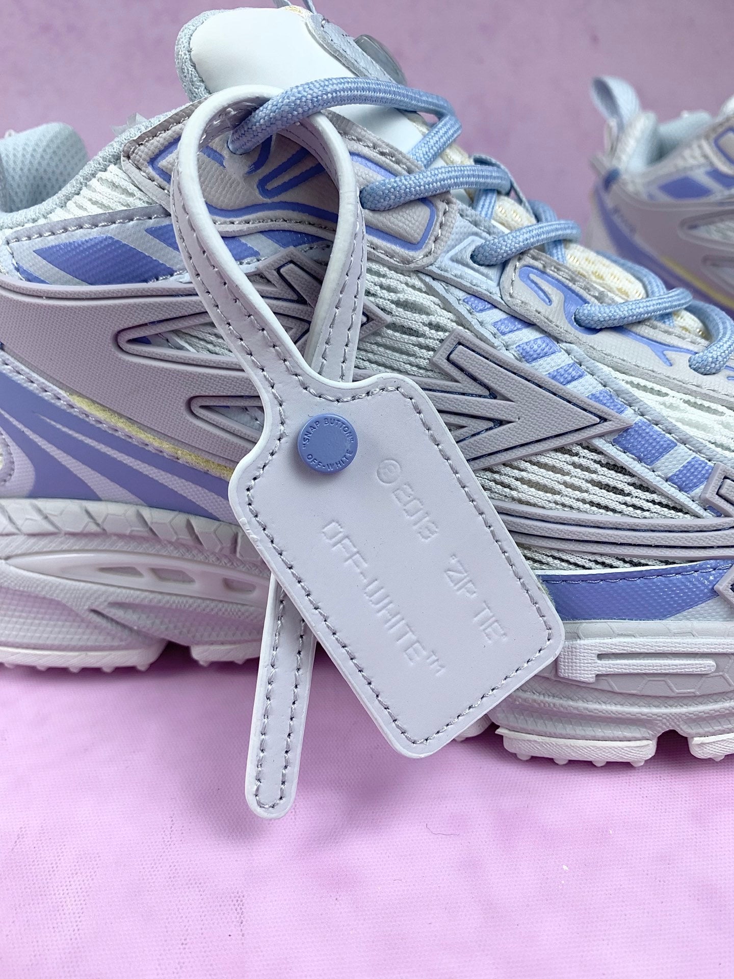 Off White and Blue Arrow Sneakers