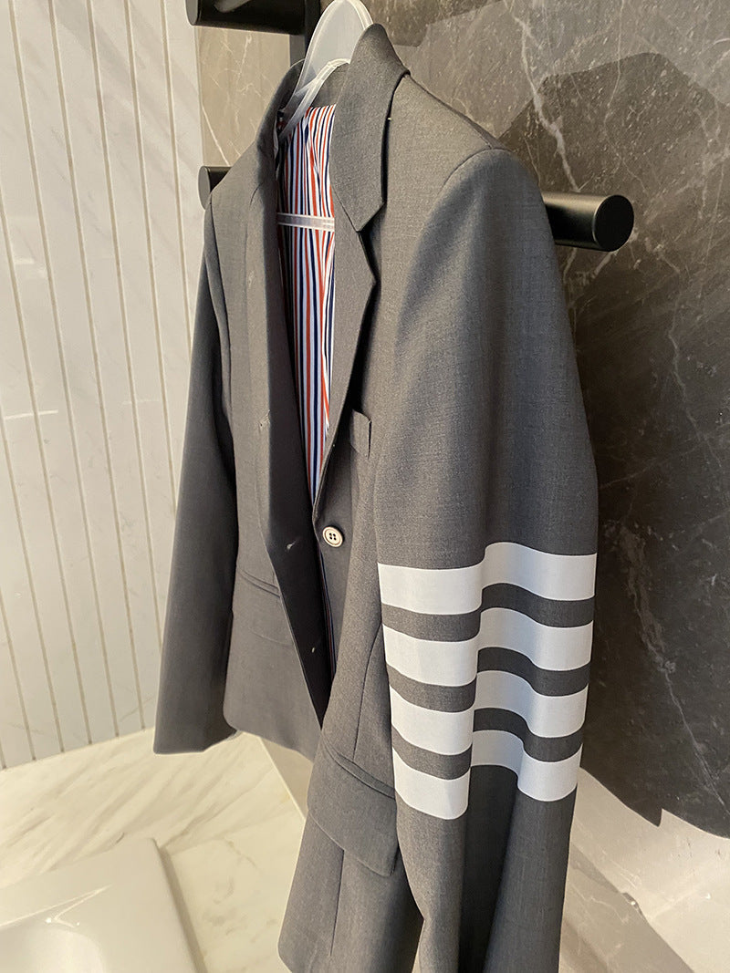 Miss  Gray suit