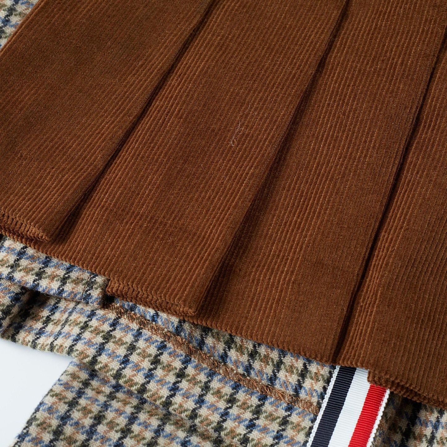 2025 Bow-tie knit sweater + pleated skirt