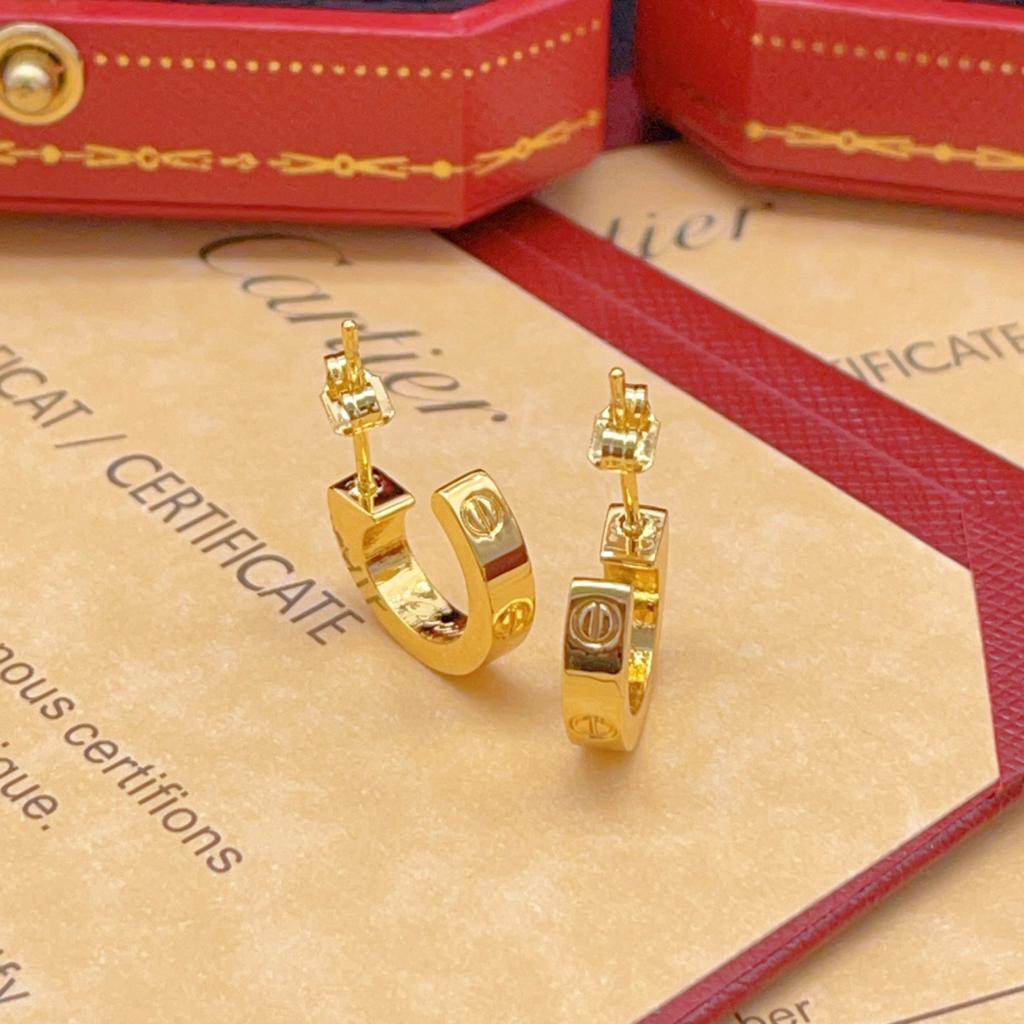 Cartier Polished Gold Stud Earrings