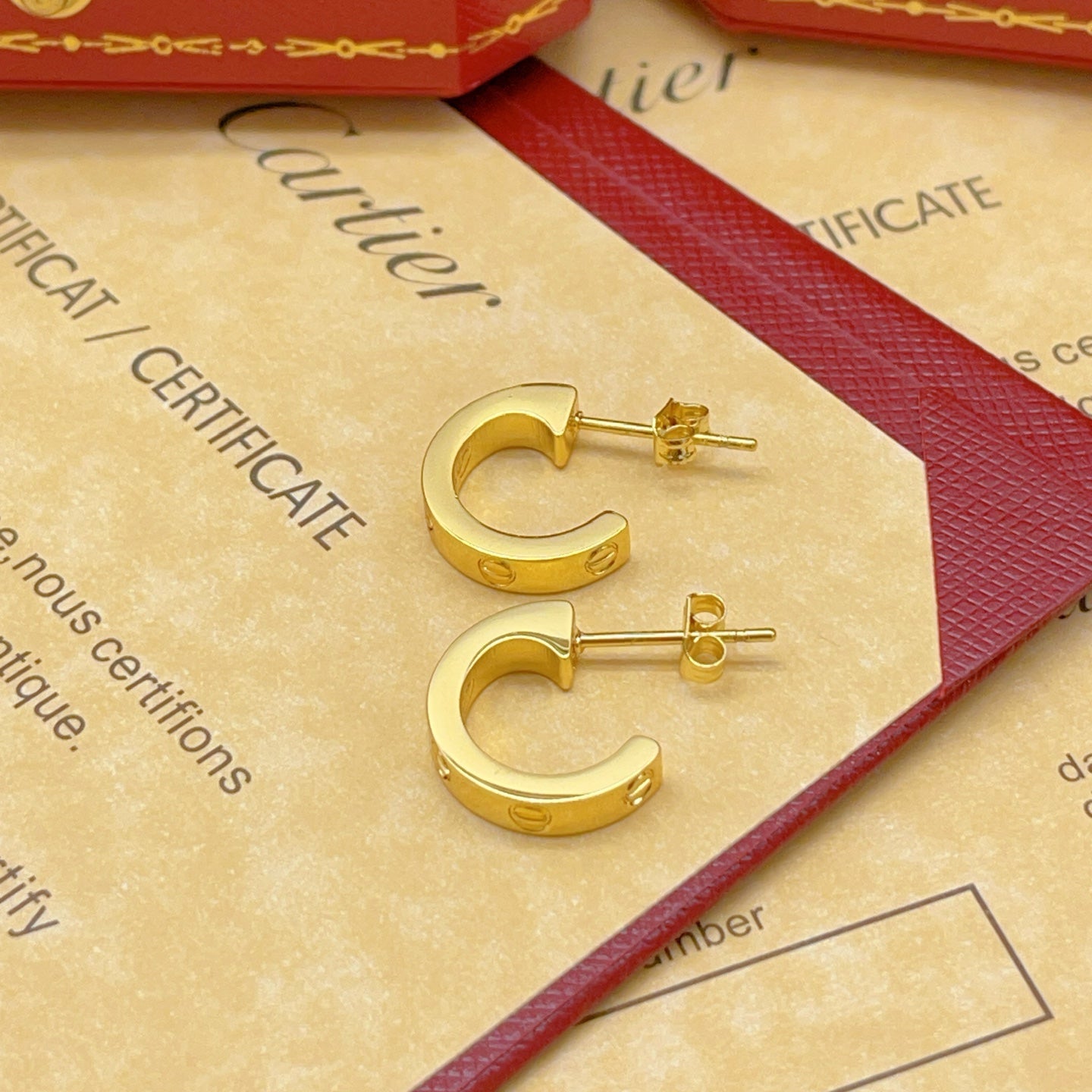 Cartier Polished Gold Stud Earrings