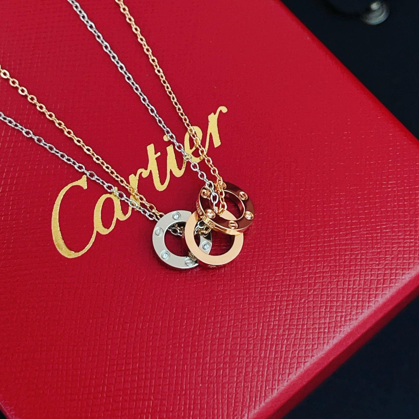 Cartier Double-Chain Necklace with Triple-Ring Pendant