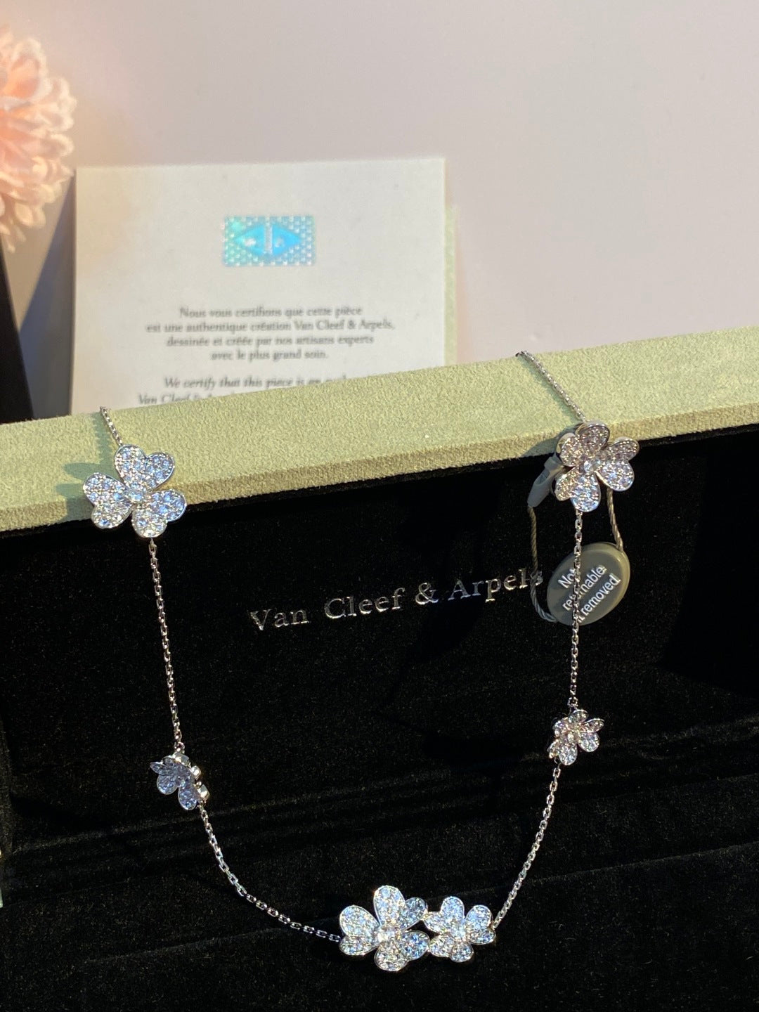 an Cleef & Arpels Pavé Diamond Clover Necklace