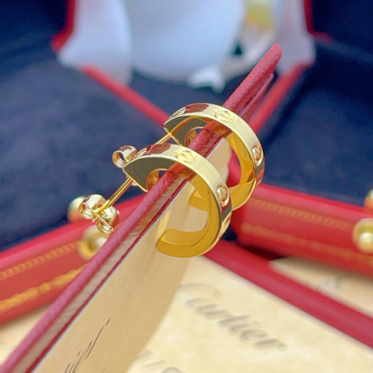 Cartier Polished Gold Stud Earrings