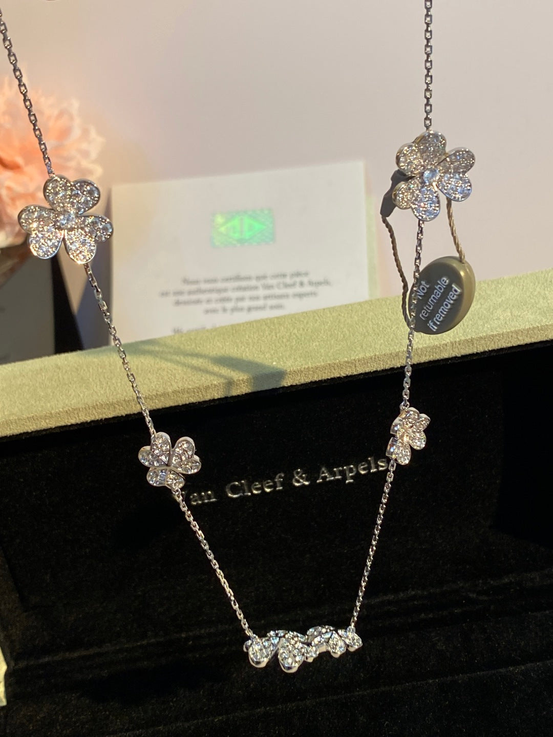 an Cleef & Arpels Pavé Diamond Clover Necklace
