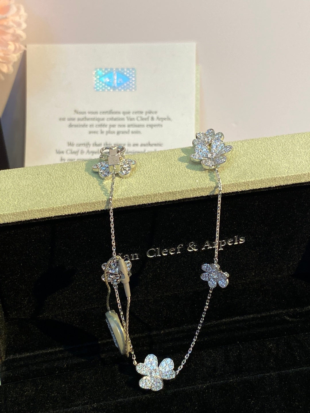 an Cleef & Arpels Pavé Diamond Clover Necklace