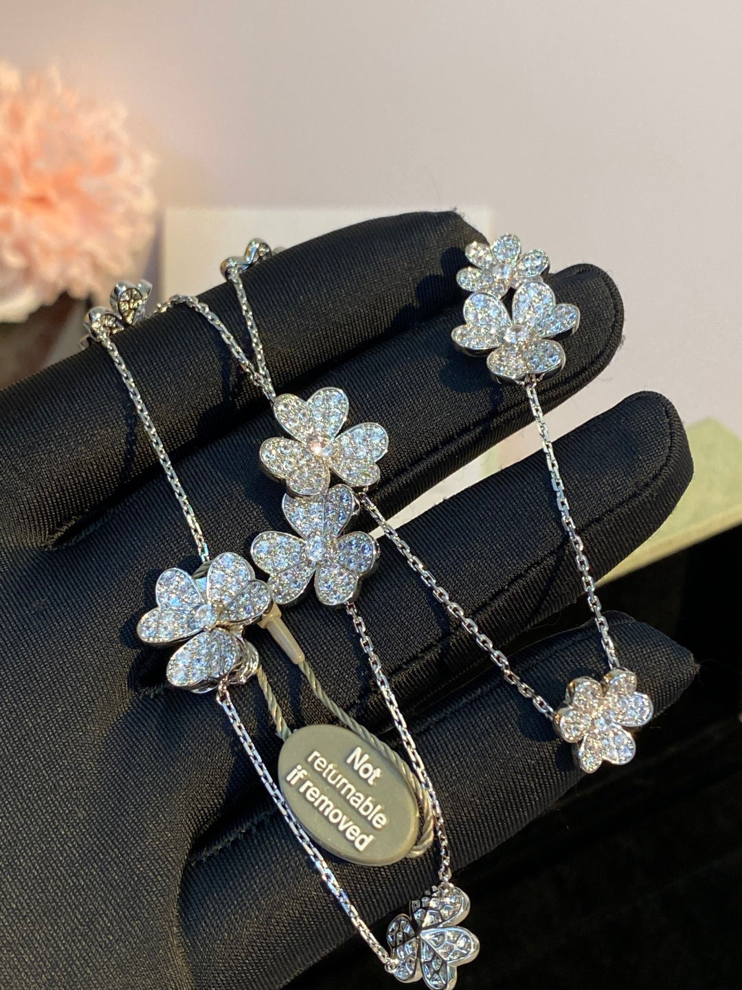 an Cleef & Arpels Pavé Diamond Clover Necklace