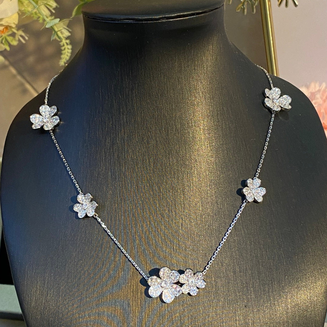 an Cleef & Arpels Pavé Diamond Clover Necklace
