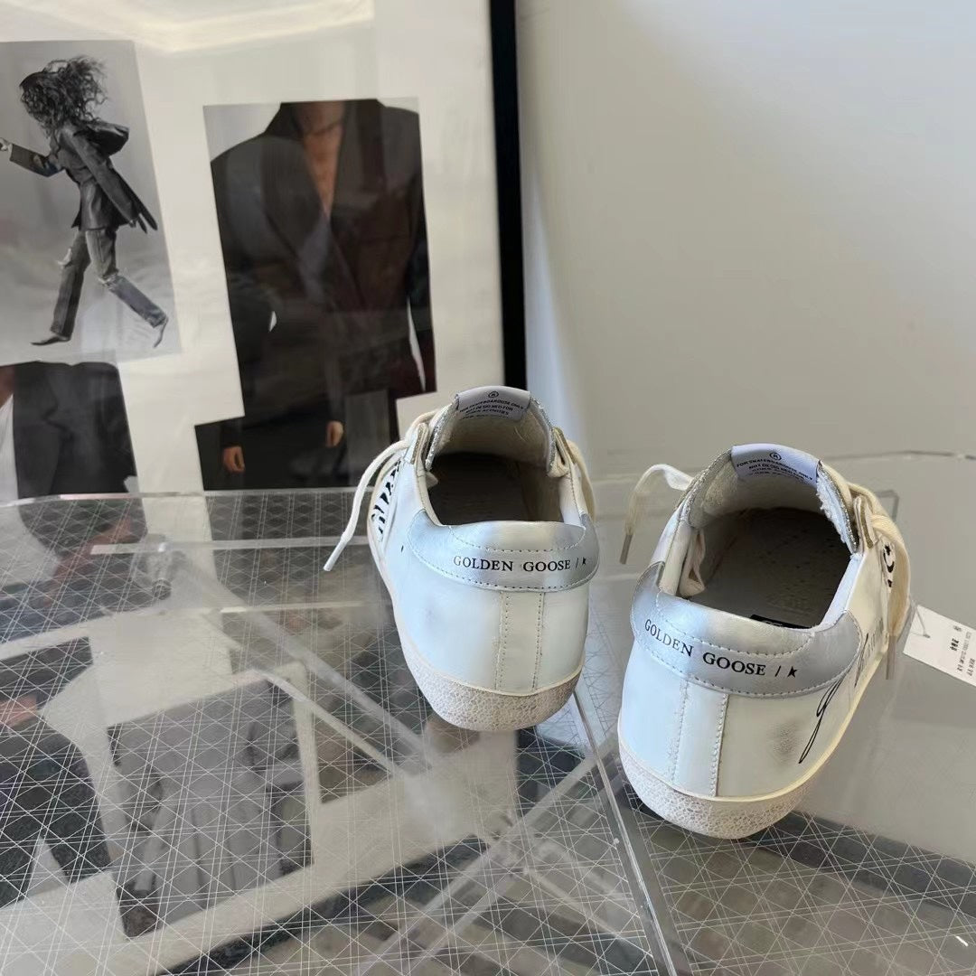 Golden Goose Vintage Distressed Sneakers #087