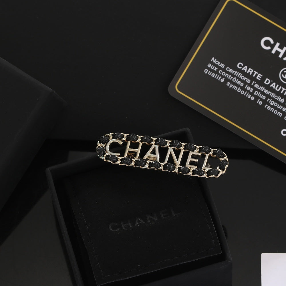 Chanel Leather Brass Brooch