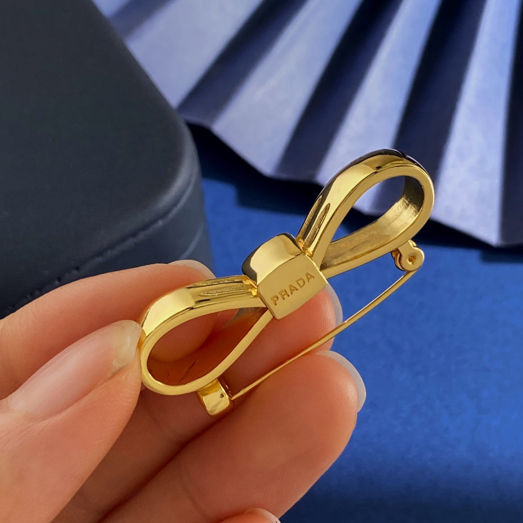 PRADA Brass Brooch