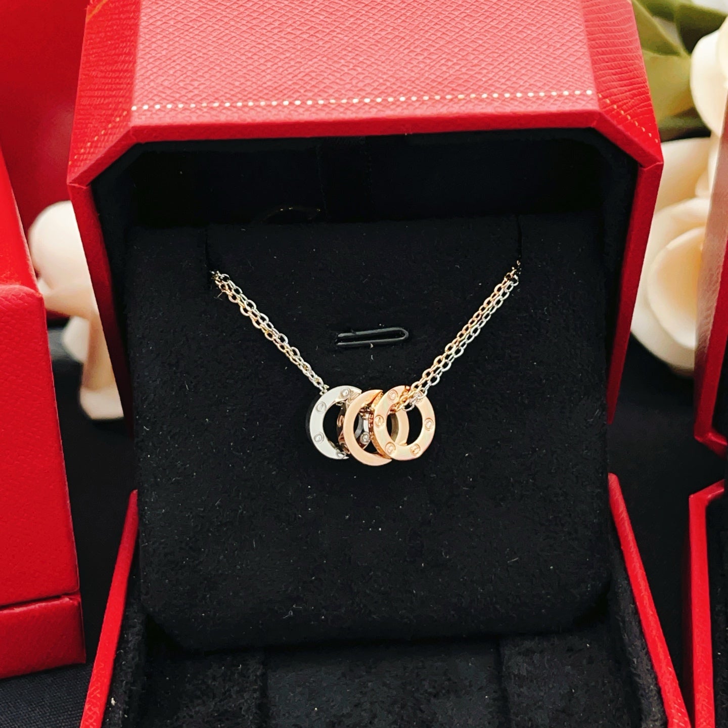 Cartier Double-Chain Necklace with Triple-Ring Pendant