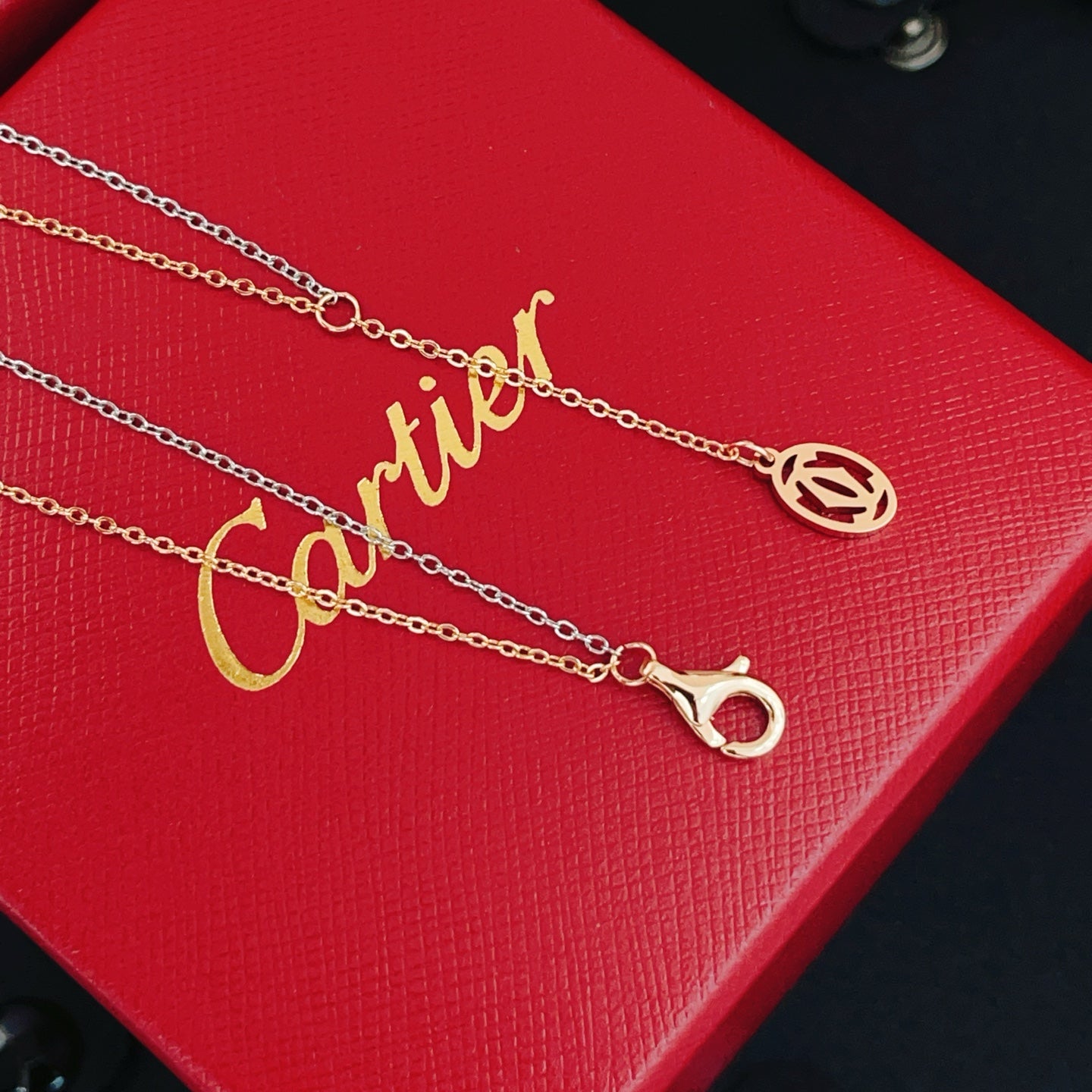 Cartier Double-Chain Necklace with Triple-Ring Pendant